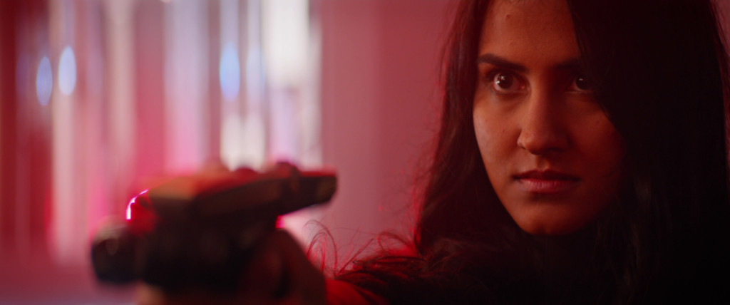 Have Phaser — will travel! Amrit Kaur as Cadet Sidhu in "Ask Not". (Photo Credit: CBS/Source: Trekcore)